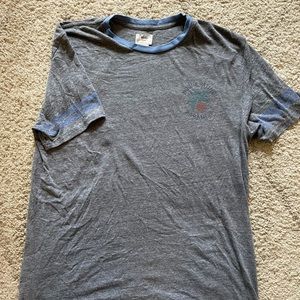 Vans “now exiting paradise” tee shirt.